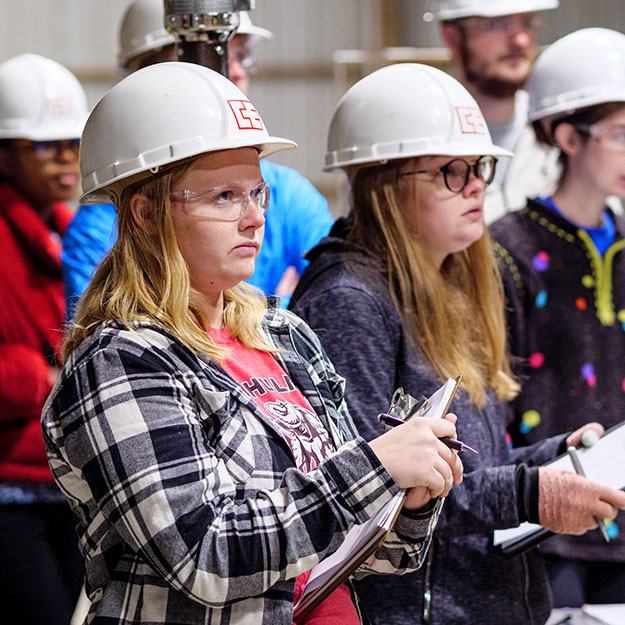 Students wearing hard hats