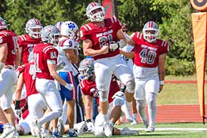 Football players celebrating a touchdown.