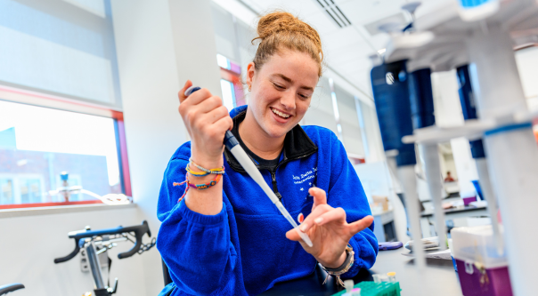 A female student working in a lab. 