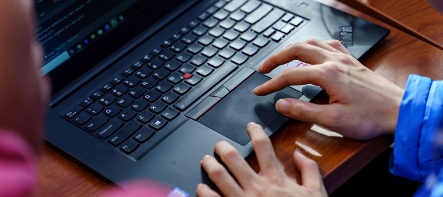 Student working on laptop computer