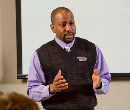 Dr. Craig Downing lecturing to a class.