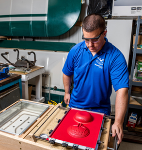 Engineer developing a part for an unmanned aerial vehicle.