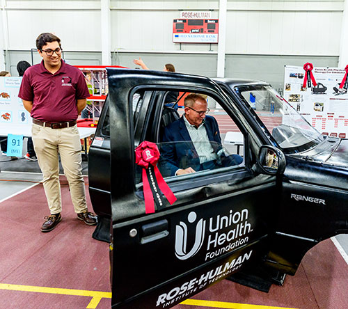 !Student with car capstone project