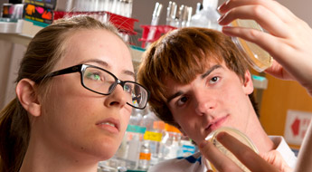 Female and Male students participating in iGEM event.