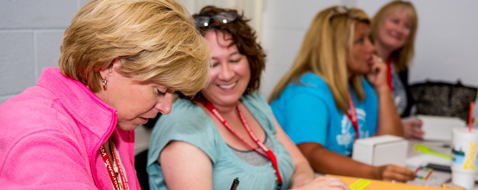 Teachers sit in a PRISM workshop.