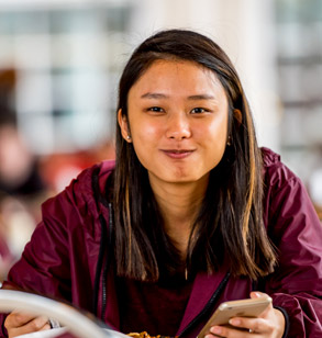 Smiling female international student.