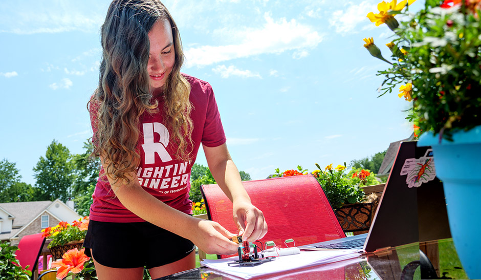 Katie Collins works on a Creation Crates project.