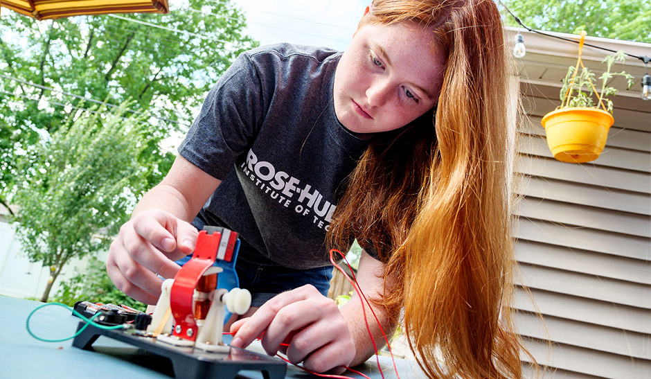 Kayla Guyer builds a motor from her Creation Crates kit.