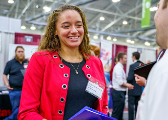 !Female student at career fair