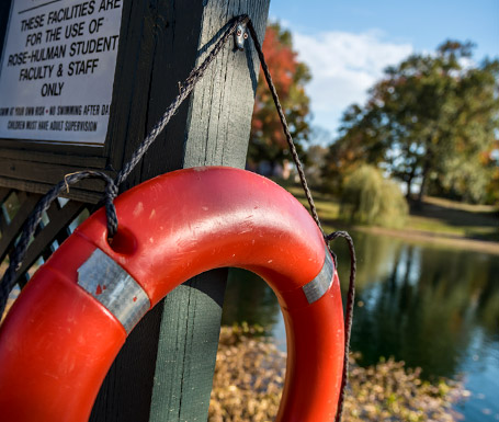 !Close-up of a life preserver near a campus lake.