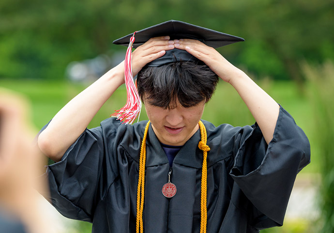 The top of a graduation cap reading: "Shine on you crazy diamond."