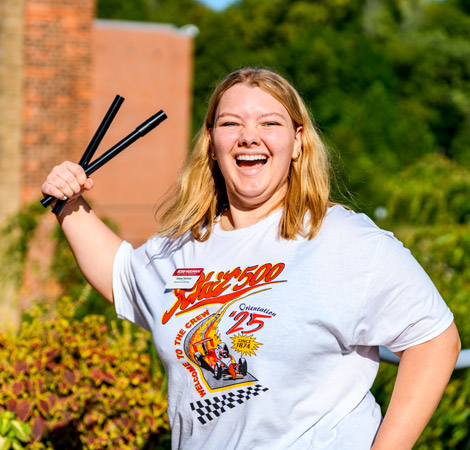 Vice President of Student Affairs Erik Hayes poses for a selfie with members of the residence life staff during move-in day.