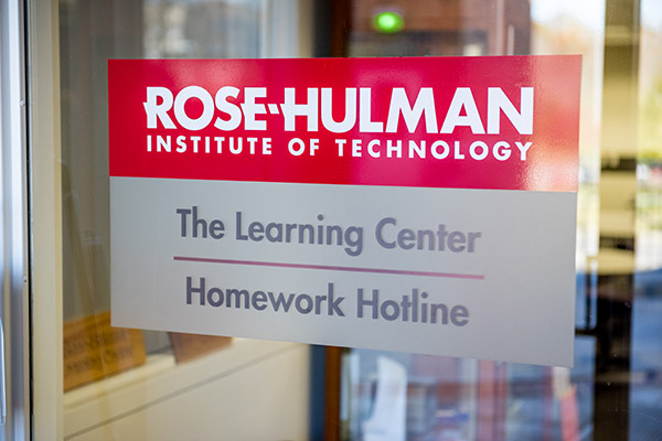 Learning Center and Homework Hotline wall sign.