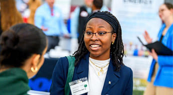 Student meets with recruiter at Career Fair.