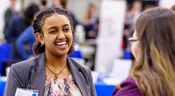 !Senior design team members explain project at Career Fair.