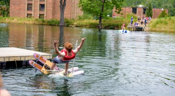 !Student falling into the lake.