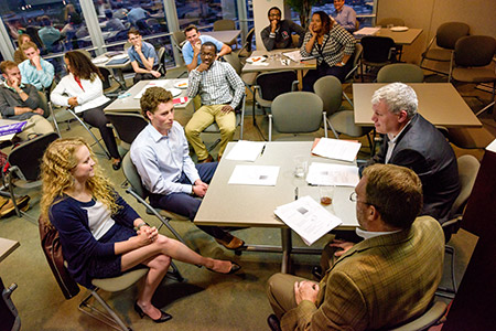 Students interacting with speaker during IP Law class