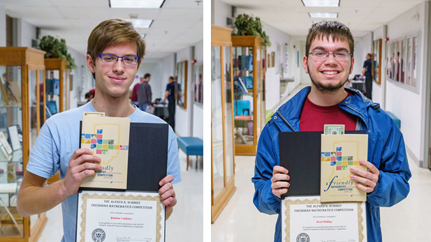 Professor John Rickert congratulates student at math contest