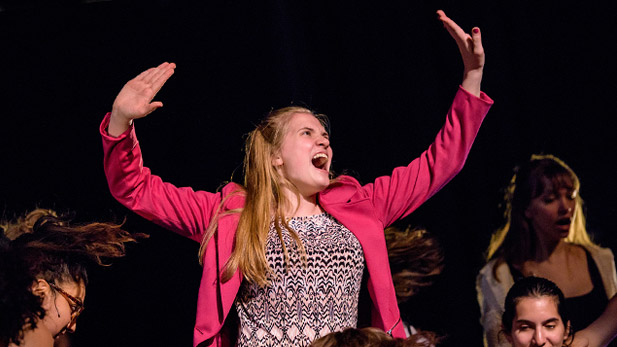 Female students on stage at Hatfield Hall