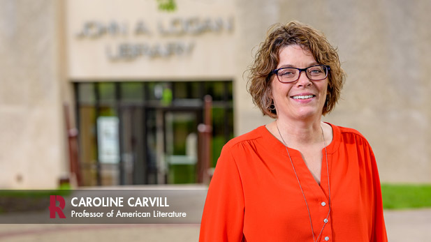 Image of Caroline Carvill standing outside Logan Library.