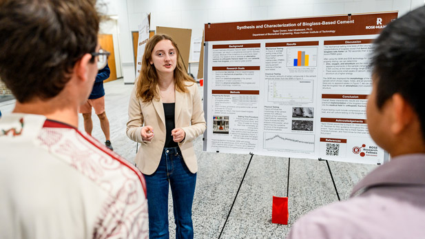 Rose-Hulman student gives a poster presentation at the Rose Research Fellows symposium.