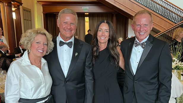 Photo of Greg Gibson and his wife, Amy, with President Rob Coons and Tammy Coons at the Indiana Historical Society's annual gala 