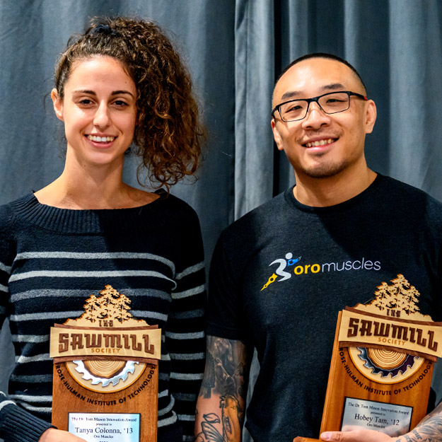 Photo of Tanya Colonna and Hobey Tam with Tom Mason Award at Sawmill Society Weekend