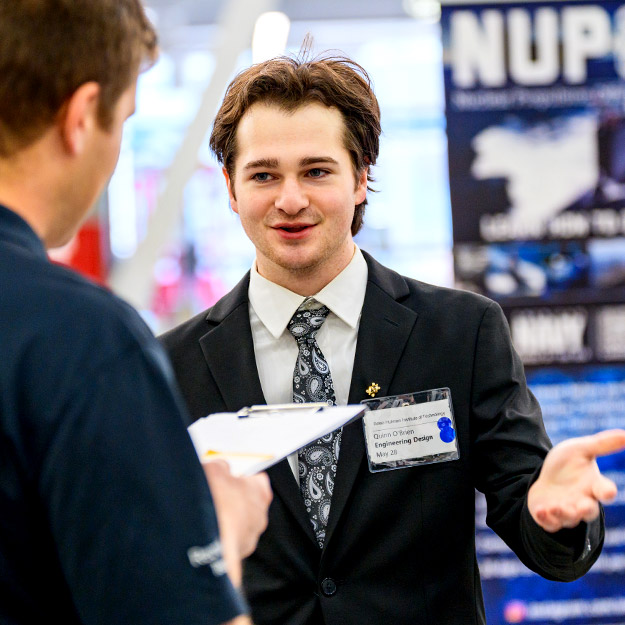 Hands shaking at the Rose-Hulman Winter Career Fair 