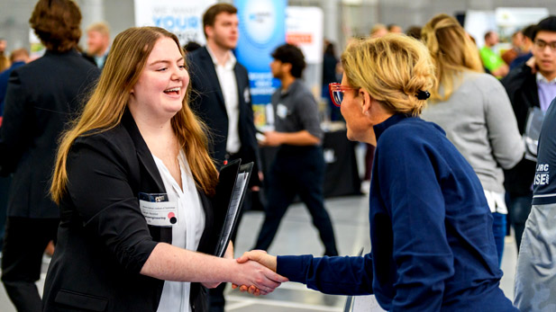 Hands shaking at the Rose-Hulman Winter Career Fair 