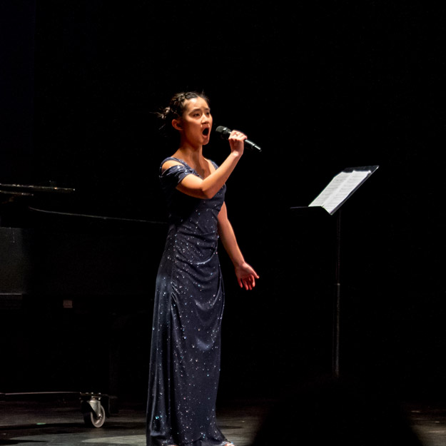 A Rose-Hulman ensemble performs on stage.