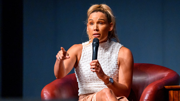 Lolo Jones speaks in Hatfield Hall with Kristen Loyd.