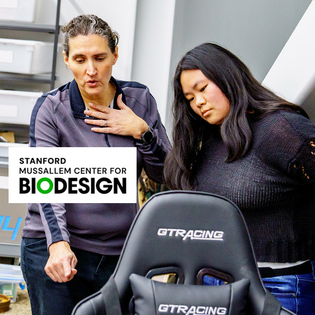 Rose-Hulman Dean of Faculty Renee Rogge, PhD, is helping to a student in a lab.